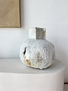 Handmade one of a kind white sculptural ceramic vase by artist, Caroline Blackburn.