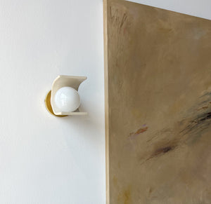 Ceramic light with curved shade. Wall sconce