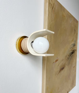 Ceramic light with curved shade. Wall sconce