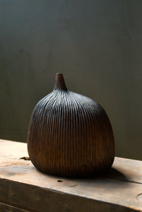 Bison Blub wood carved textured surface dark brown by Ashley Martin