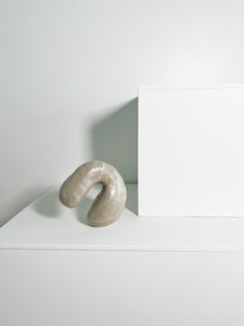 glazed cream colored organic ceramic shaped sculpture by Re Jin Lee