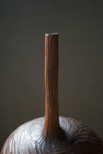 walnut dark brown handcarved wooden sculpture by ashley martin 