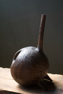 walnut dark brown handcarved wooden sculpture by ashley martin 