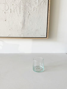 one medium recycled hawkins ny glass sitting on  a white counter top