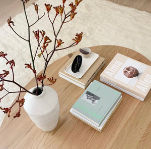 styled coffee table, featuring the white Payton Vase.